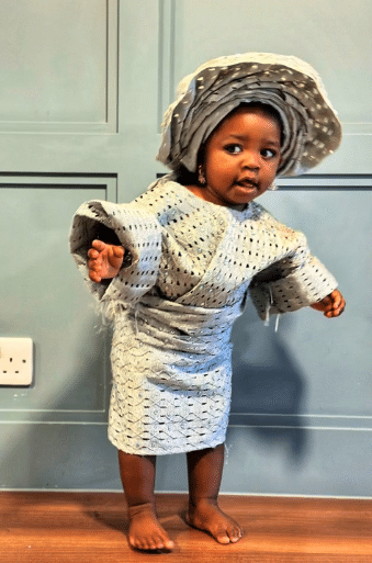 Little girl leaves many in awe as she slays Yoruba attire and Gele to perfection