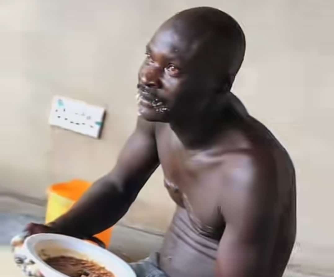 Nigerian man evokes concern as he soaks Garri in big pot, devours it with beans