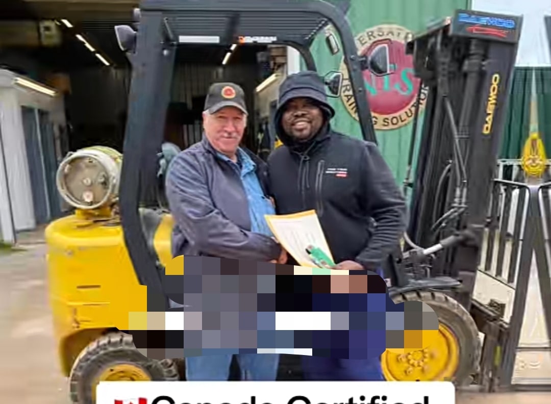 Nigerian man celebrates as he becomes certified forklift driver in Canada
