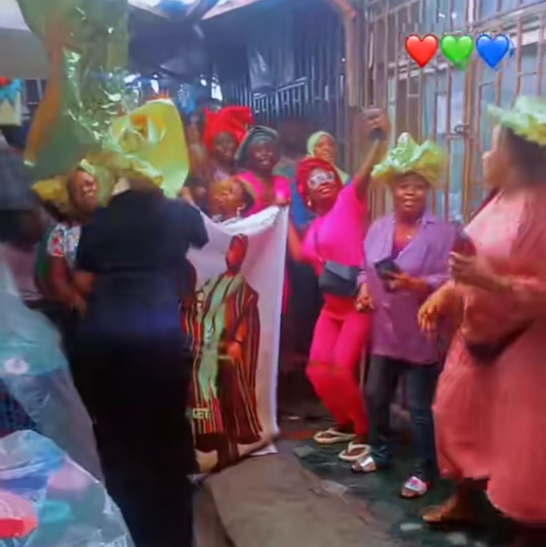 Nigerian women host banner of Davido and Chioma, dance and sing after missing wedding