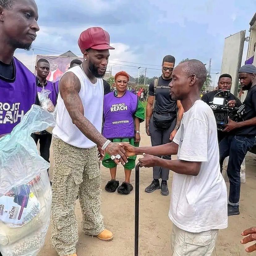 Burna Boy and mother, Bose Ogulu distribute free food items in Port Harcourt