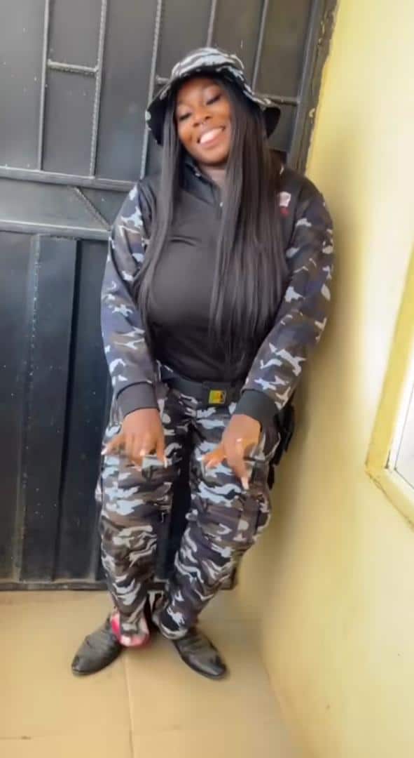 Lady under heavy criticism as she rocks father's police uniform