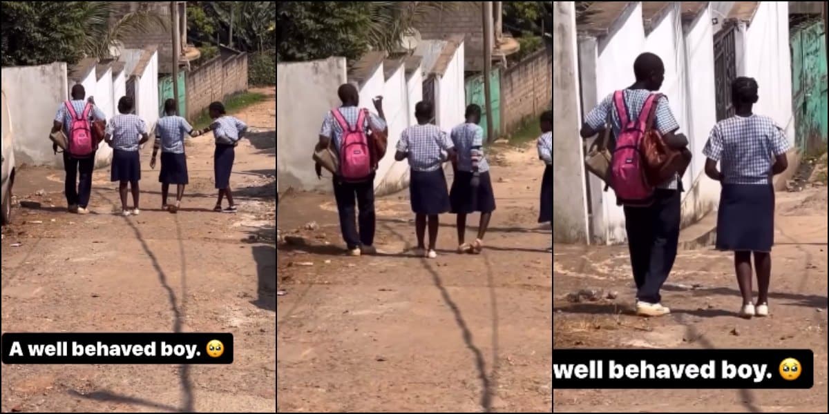 young boy bags female classmates