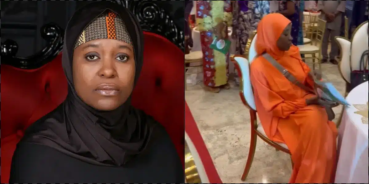Aisha Yesufu refuses to stand during recitation of new national anthem