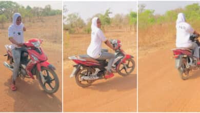 Physically challenged lady shocks many as she is seen riding bike with one hand