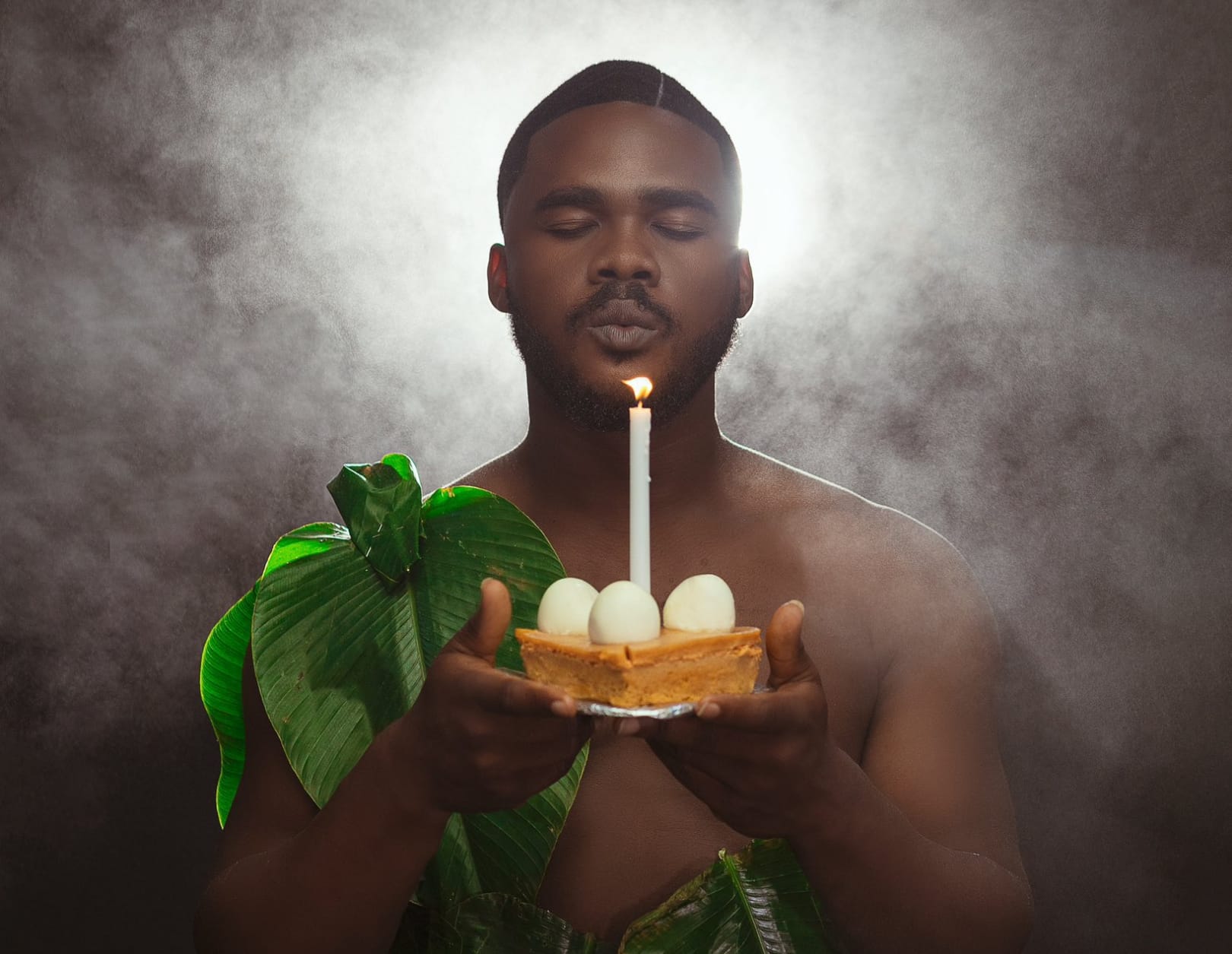 Nigerian moi moi seller stuns internet with leaf outfit, moi moi cake on 25th birthday
