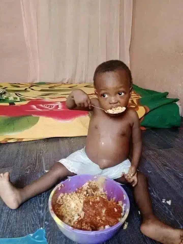 Photo of little child devouring large bowl of rice causes serious buzz online