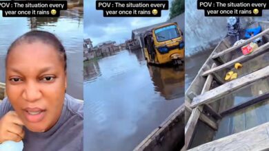 Nigerian lady uses canoe for transportation as her street floods due to heavy rainfall
