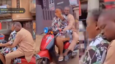 Nigerian man sweetly embraces wife while she drives motorcycle, captures hearts online 