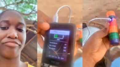 Nigerian lady stuns social media with power bank made from bottle caps, charges phone with it
