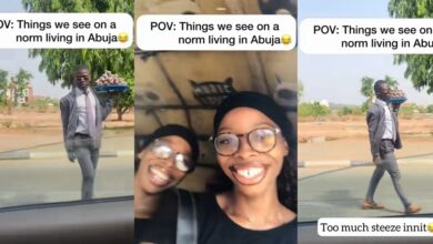 Nigerian lady sparks online conversation with video of suit-wearing hawker in Abuja