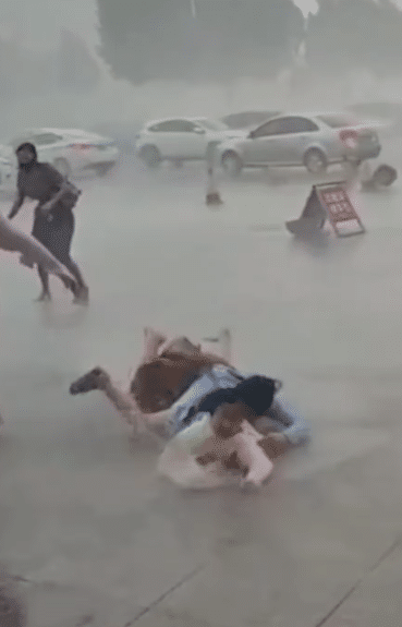 Shocking moment wind sweeps off mother and daughter