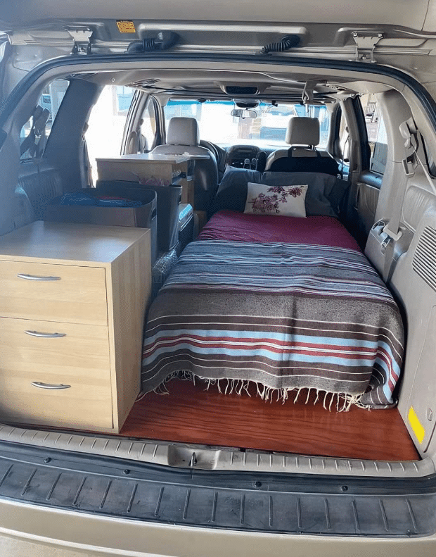 Photo of car boot turned into cozy bedroom causes serious buzz online