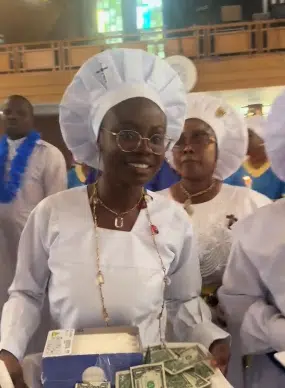 Lady dances joyfully as she celebrates her graduation in church, carries tray of dollars 