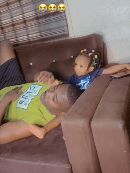 Nigerian man peppers jealous wife, rests his head on little daughter's lap