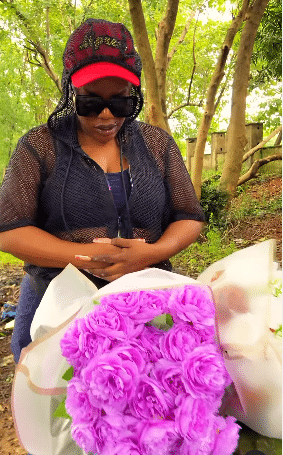Empress Njamah visits Ada Ameh’s graveside with flowers on 2nd anniversary of her demise
