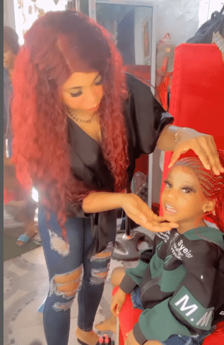 Lady fixes nails, eyelashes, wig for little daughter, video sparks outrage 