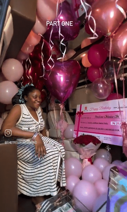 Lady in shock as man surprises her with N20 million cheque on her birthday