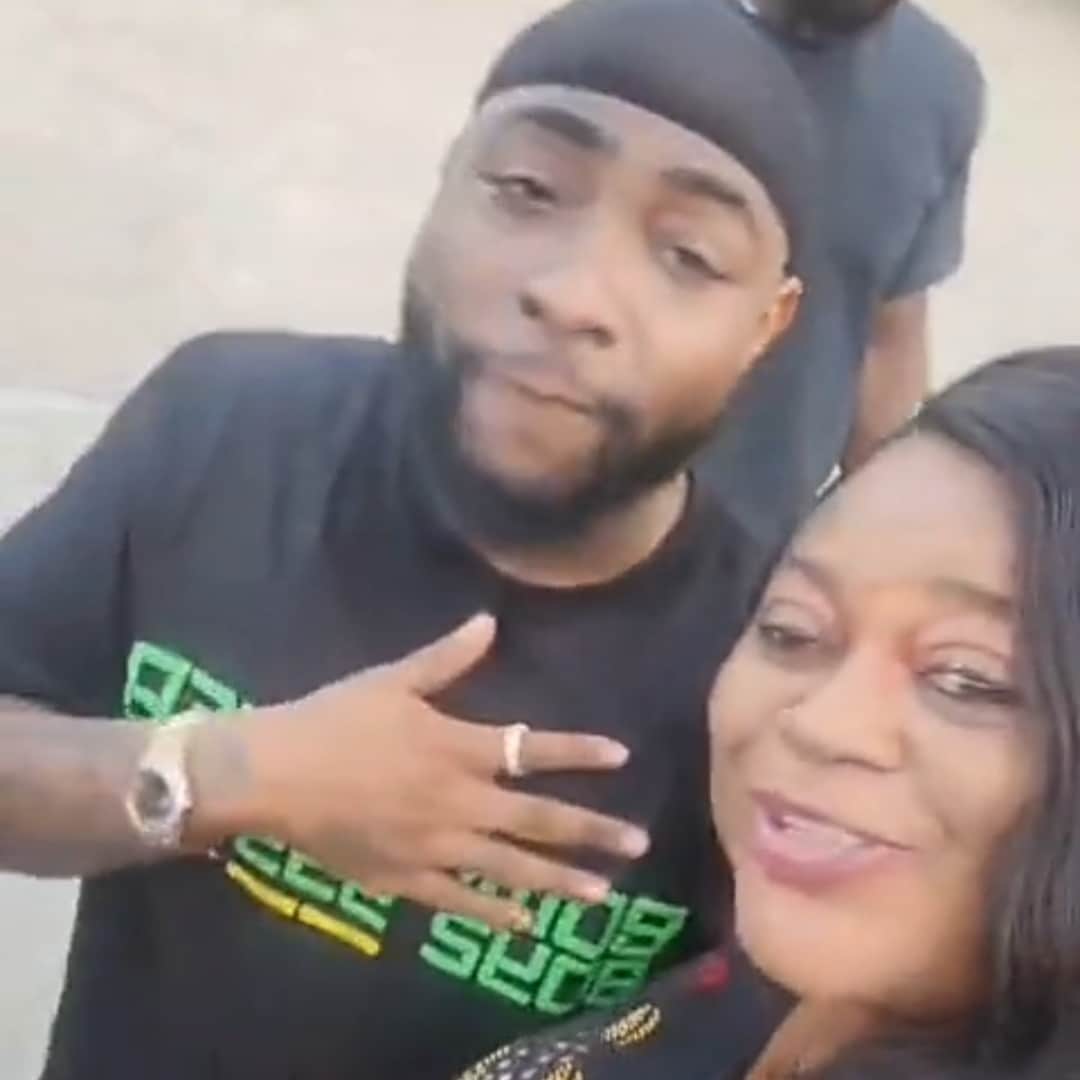 Nigerian woman labels herself 'Davido's mother' as she meets singer