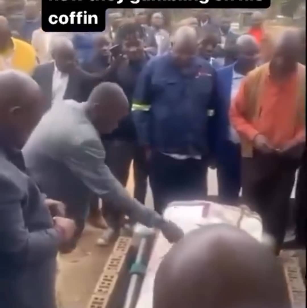 Gamblers pay last respects by gambling on coffin of fallen colleague