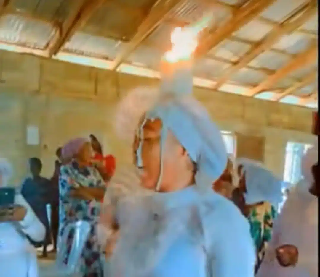 Nigerian lady’s unique prayer method In cherubim and seraphim church goes viral