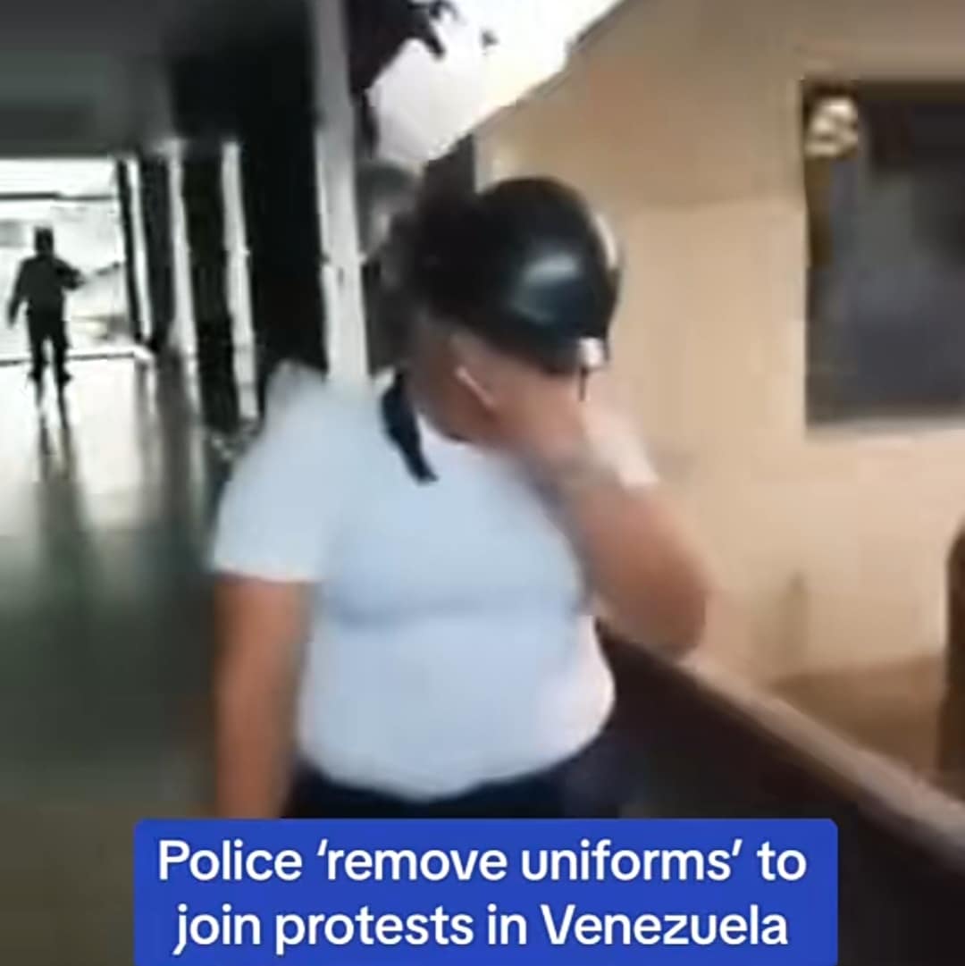 Drama as Venezuelan police officers remove uniforms to join peaceful protest against government