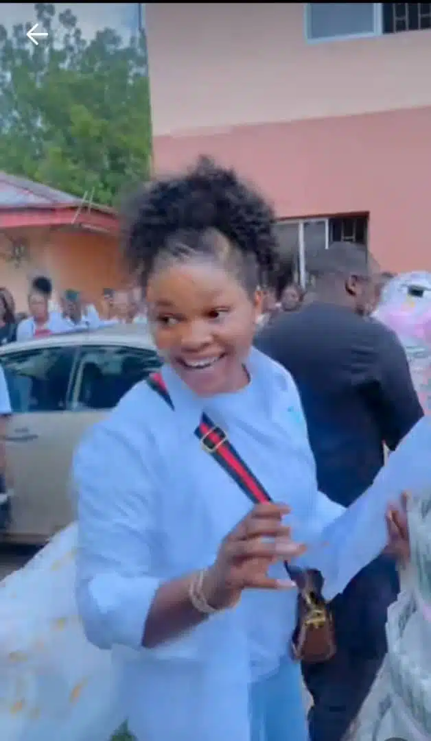 Nigerian lady's reaction as boyfriend surprises her with money bouquet on sign-out day