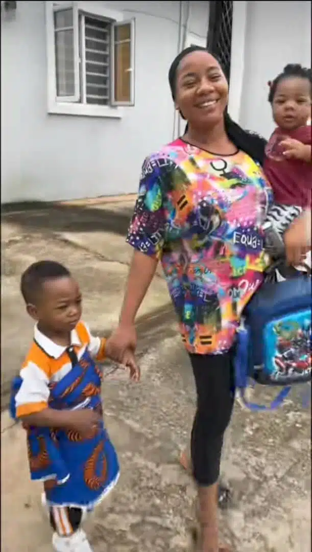 Little boy insisting his mother tie a wrapper for him to wear to school sparks reactions