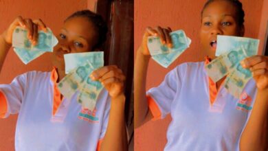 Lady joyfully flaunts foreign currencies she found in sweater she bought