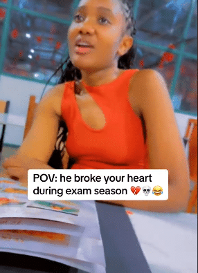 Lady weeps uncontrollably while studying after boyfriend dumped her during exam