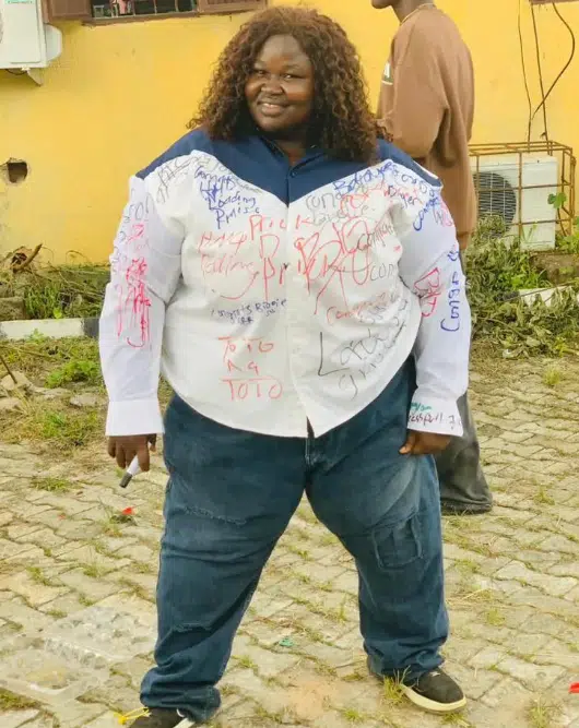 Photos of plus-sized female graduate goes viral as she signs out in grand style