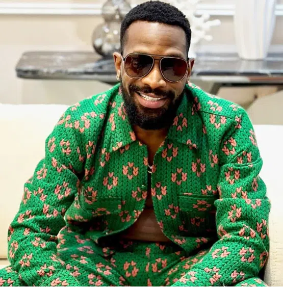 D'Banj dragged online for 'prostrating' to Pastor Jerry Eze during his birthday visit