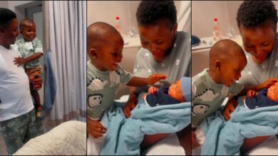 Adorable moment little boy meets his baby sibling for the first time