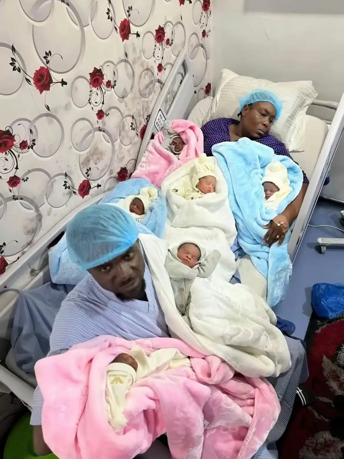 Woman's facial expression stirs sympathy after welcoming sextuplets