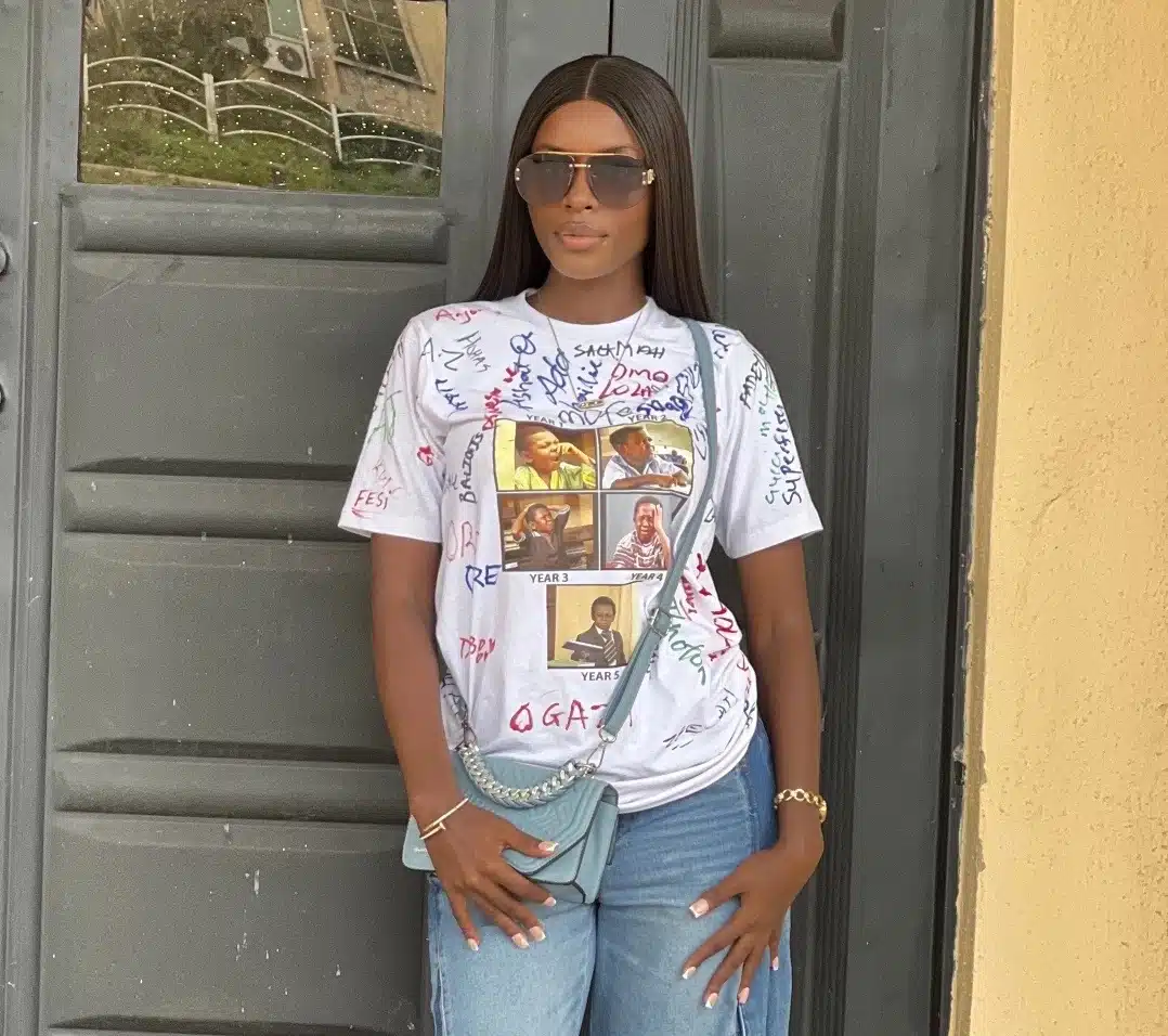 Lady shows off unique sign-out outfit featuring Aki and Pawpaw photos to celebrate graduation