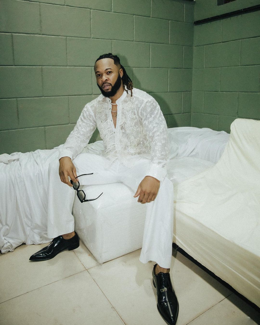 Flavour reacts as lady cautions Chidimma Adetshina to avoid him