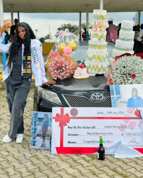 Lady signs out from university with a bang, shows off gifts