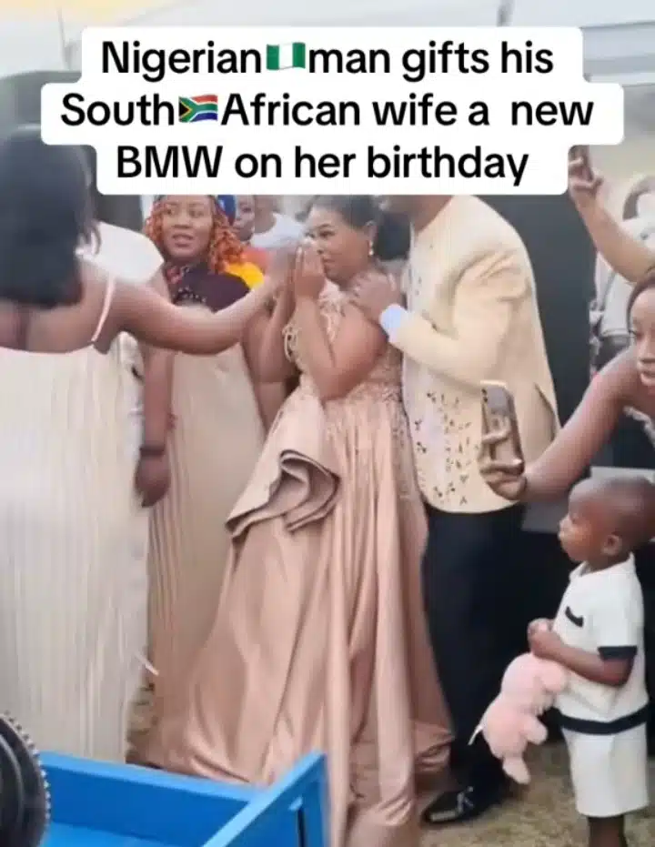 South African lady emotional as her Nigerian husband gifts her a BMW as birthday gift