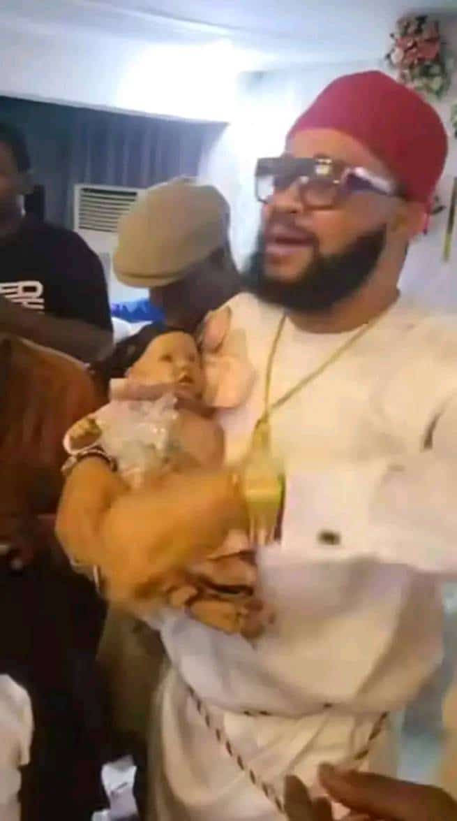 Couple reportedly uses a doll baby to stand in for their daughter during celebration