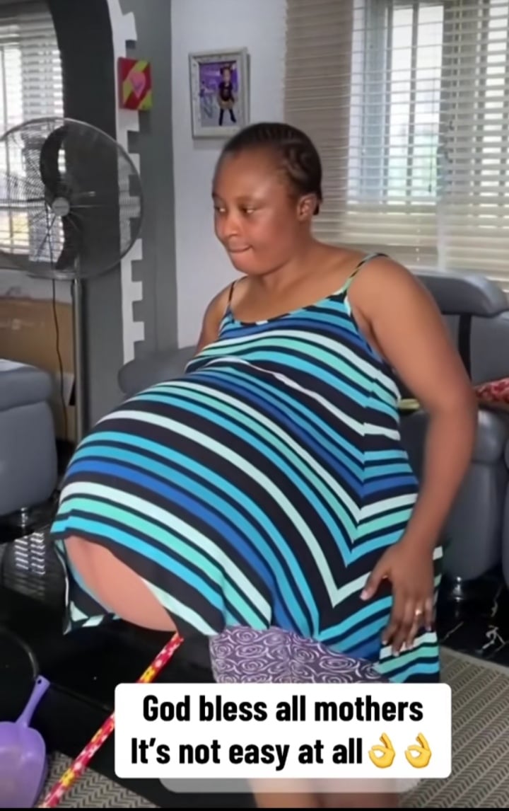 Pregnant lady shows off her huge baby bump, video stirs shock