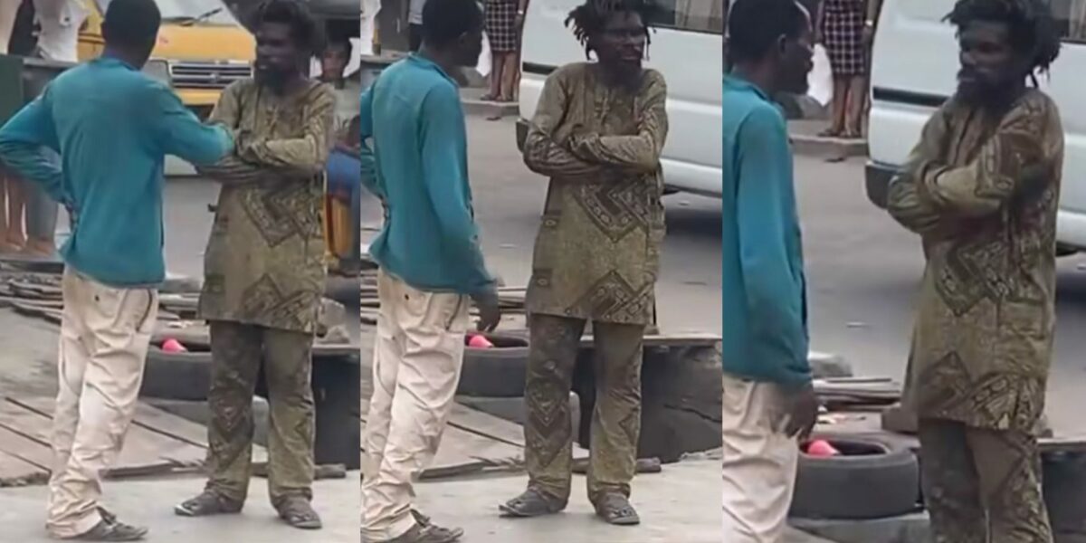 Moment two mentally challenged men were spotted conversing in a busy road