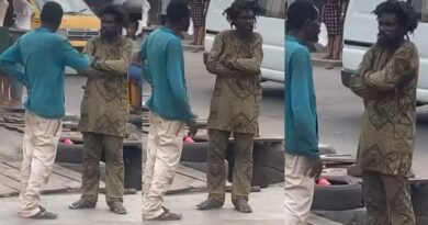 Moment two mentally challenged men were spotted conversing in a busy road