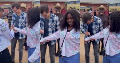 Lady excited as her Caucasian man flies from US to attend her sign-out