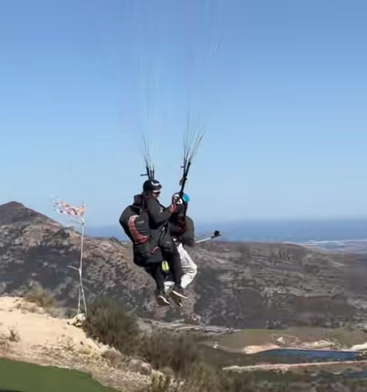 Lady shares dad’s hilarious reaction to her paragliding video