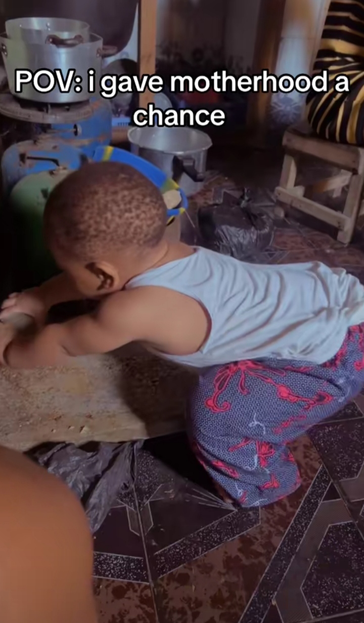 Mother baffled as she sees little son using grinding stone in the kitchen