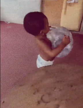 Mom left speechless as little daughter effortlessly carries heavy water bag