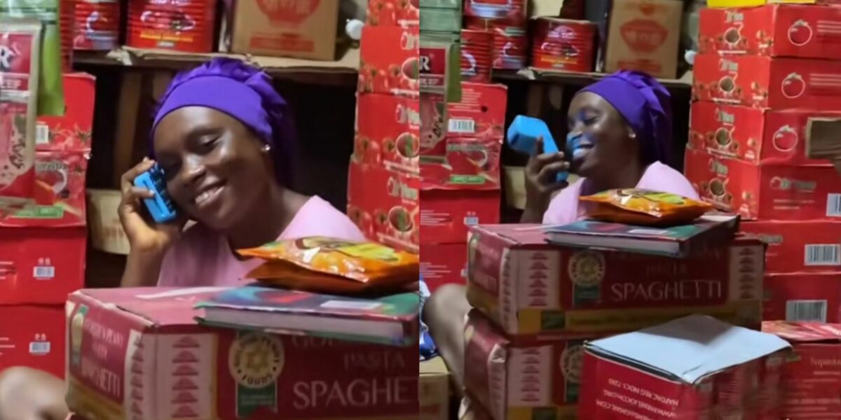 Reactions as lady is spotted making call with POS machine