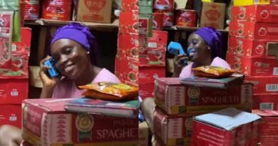 Reactions as lady is spotted making call with POS machine