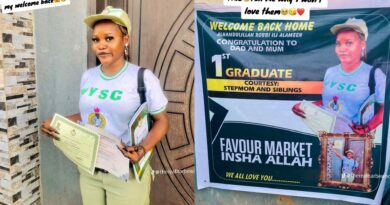 "First graduate" – Family sets up huge banner as their daughter completes NYSC