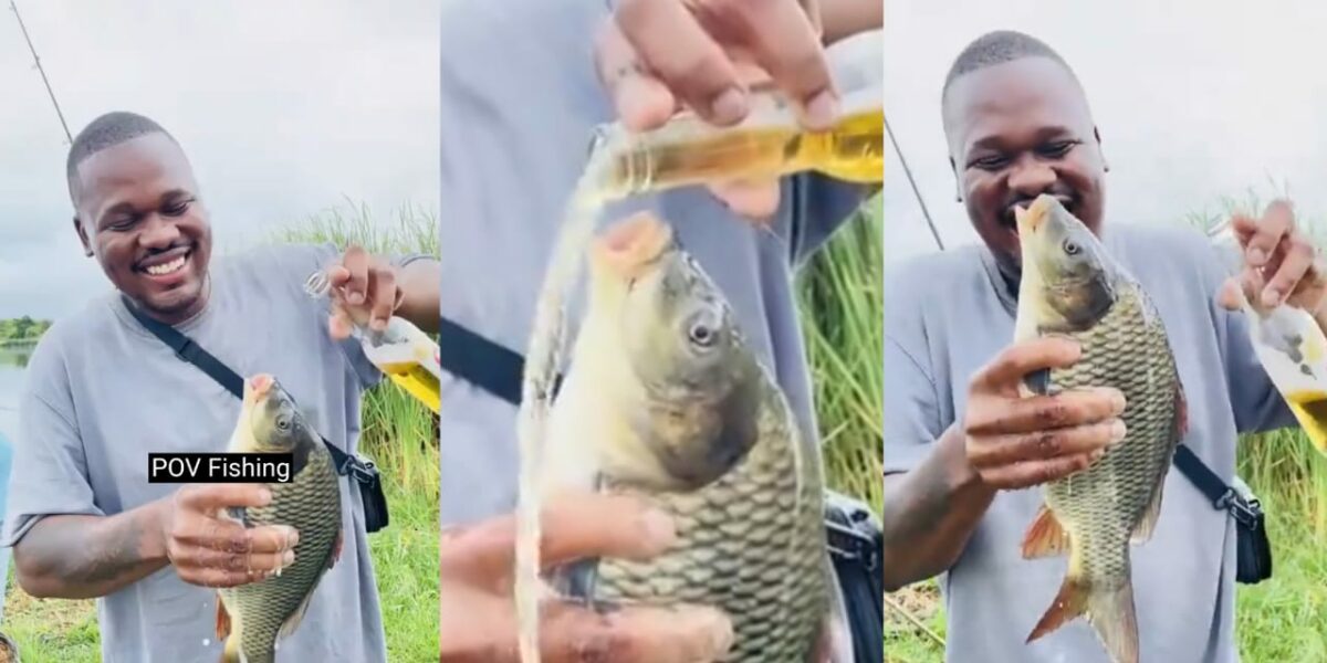 Outrage as man captures fish and pours drink into its mouth